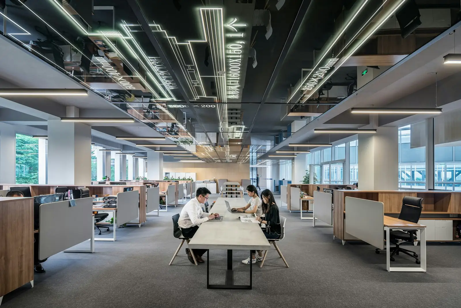 Open-plan office with grey carpet tiles